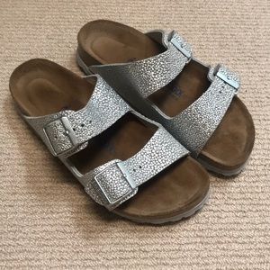 Size 36 silver Birkenstock’s.